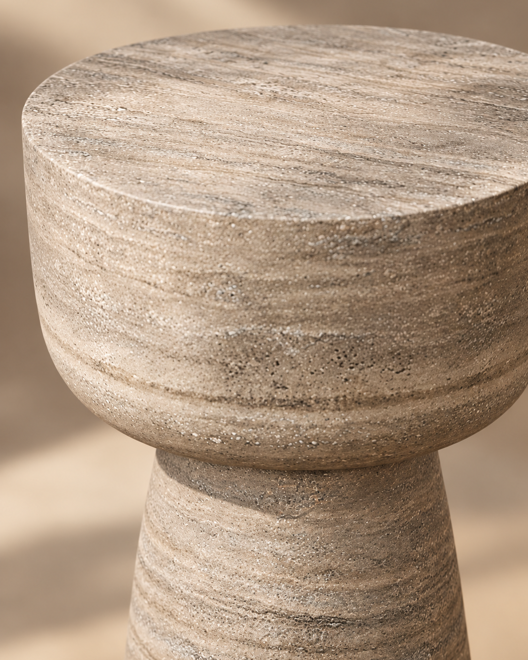 Washed concrete texture and rounded edge of the Maro side table