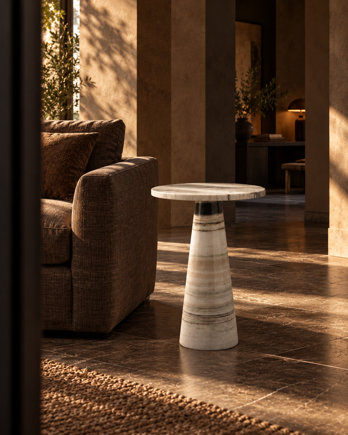 Vellora ivory marble side table in a sunlit architectural living space