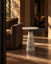 Vellora ivory marble side table in a sunlit architectural living space