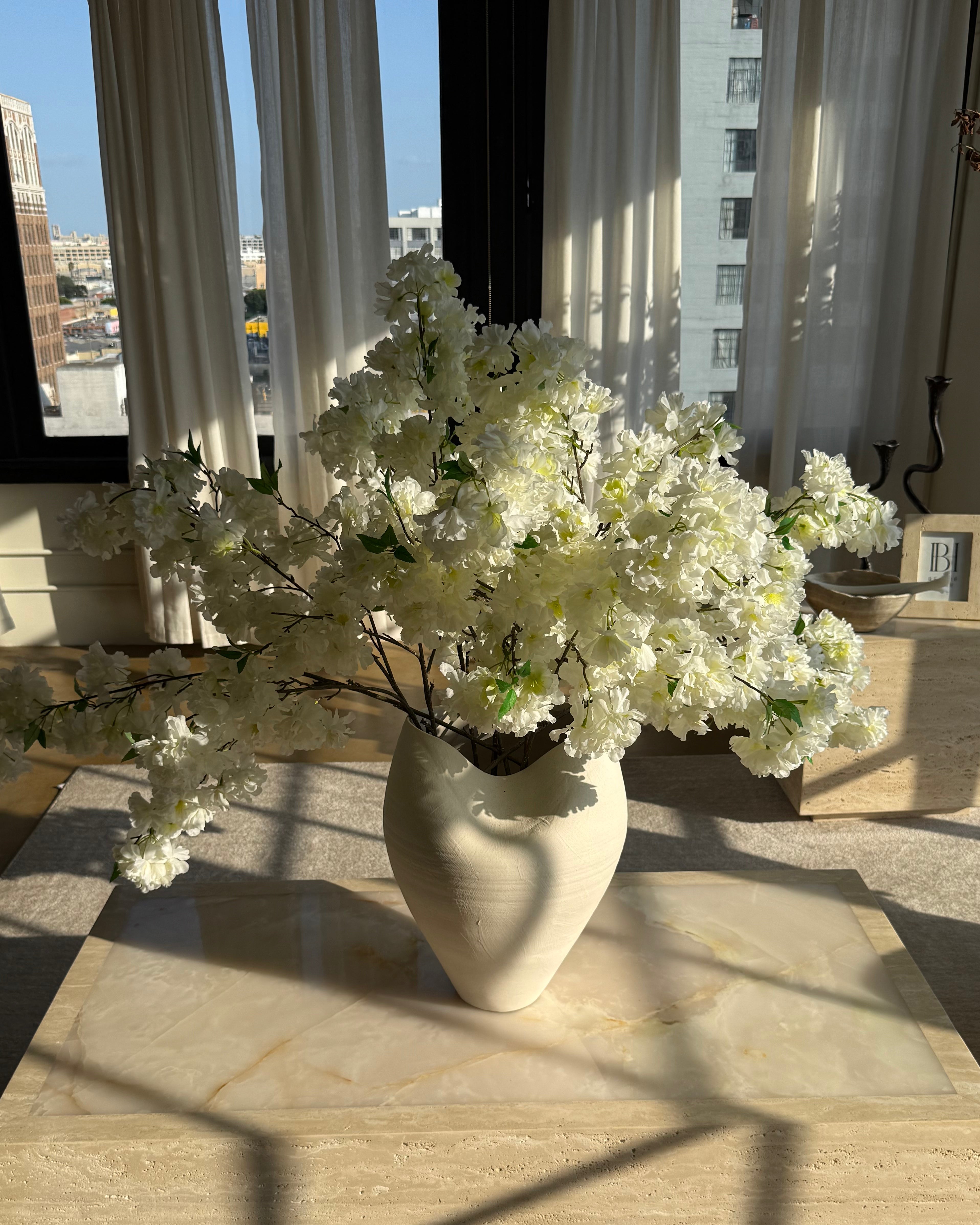 42” cream cherry blossom branch stem in a decorative vase, by Belaré Home