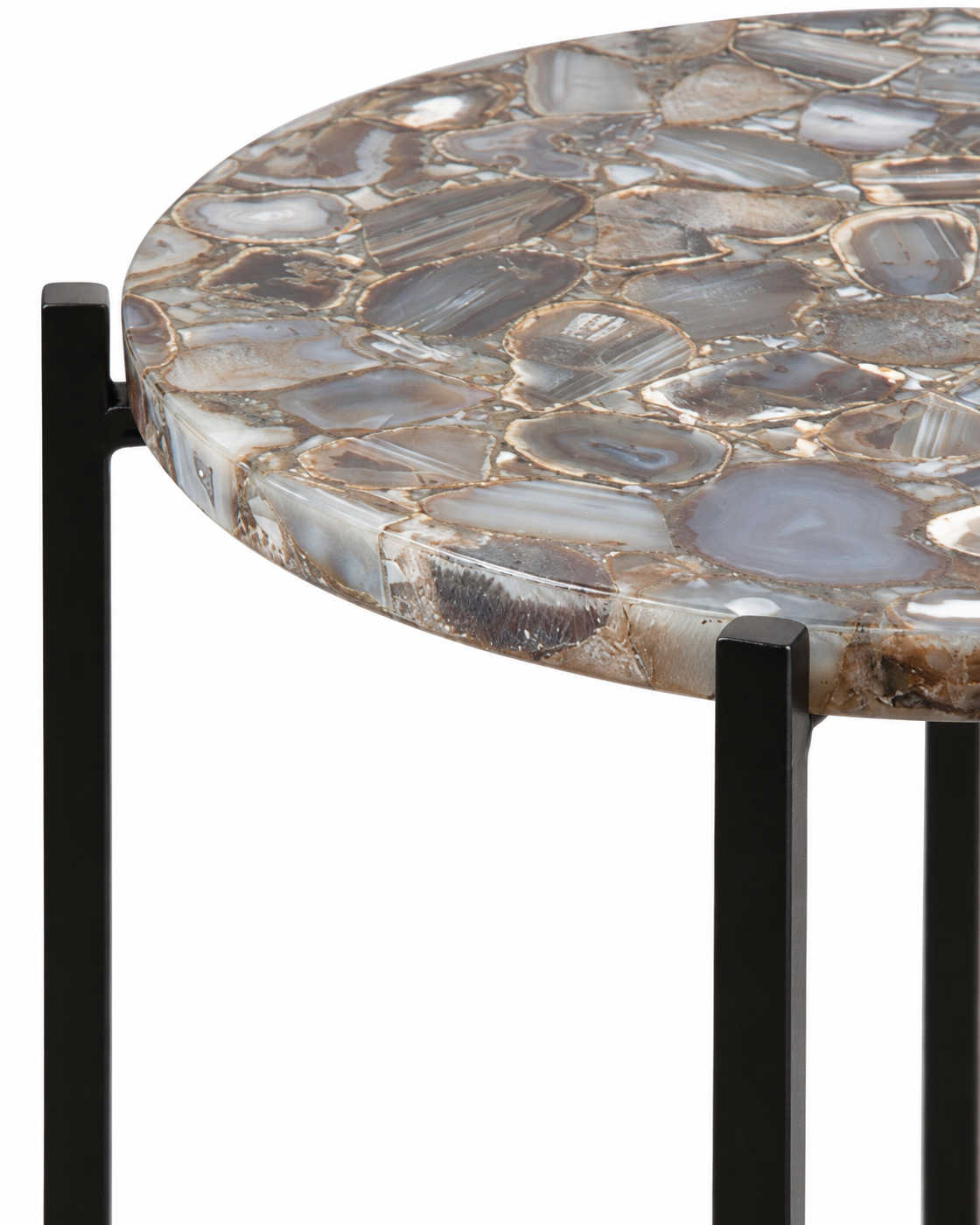 Close detail of the Orlina gray-beige agate top and black iron support.